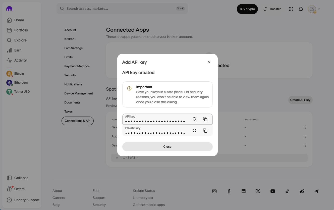 El cuadro API key created de Kraken: la API key y la private key, cada una con un botón para copiar, y el aviso de que no se pueden volver a ver.